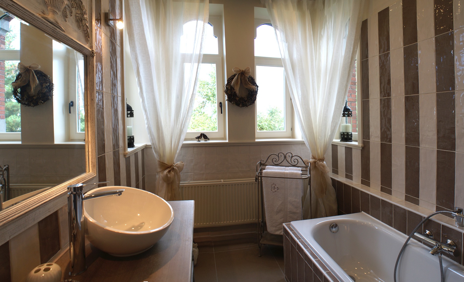 La salle de bains de Buff Beauty, avec sa baignoire